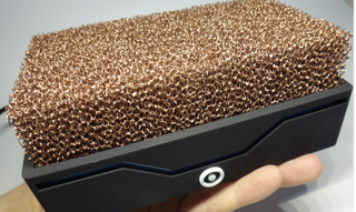 Illustration for article titled A Nest of Copper Foam Lets This Tiny PC Run Silently Without Fans
